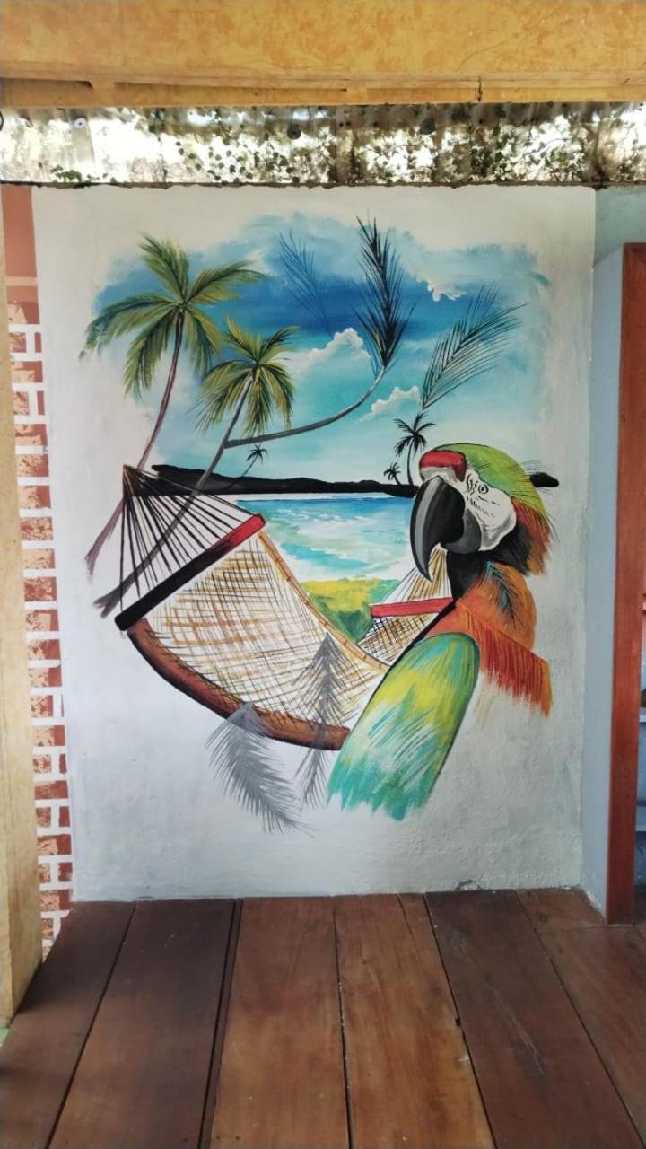 Hotel El Delfin Livingston Bagian luar foto